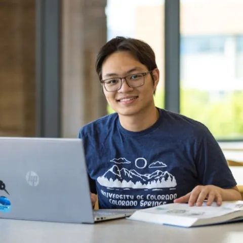 student working on computer